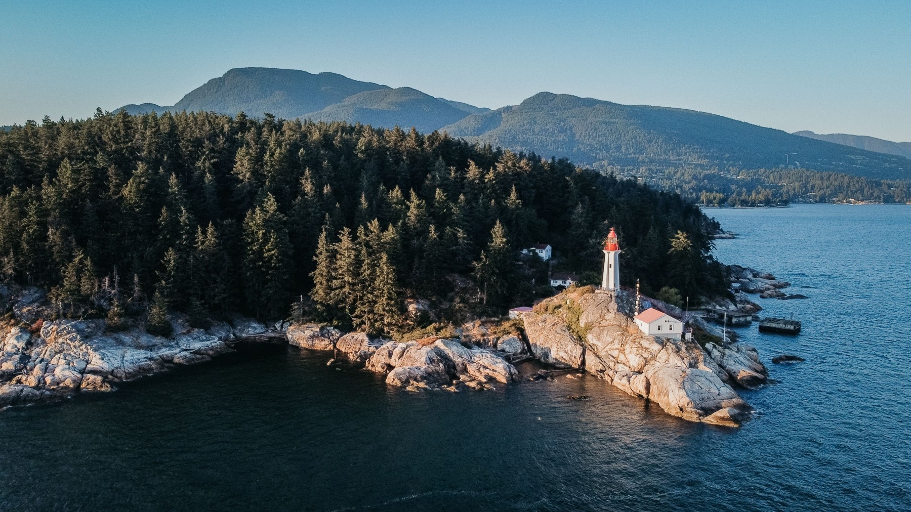 Point Atkinson Lighthouse on the rocky shoreline of Lighthouse Park in West Vancouver